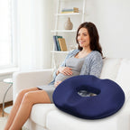 Woman holding navy blue memory foam seat cushion with center opening for office and home chairs
