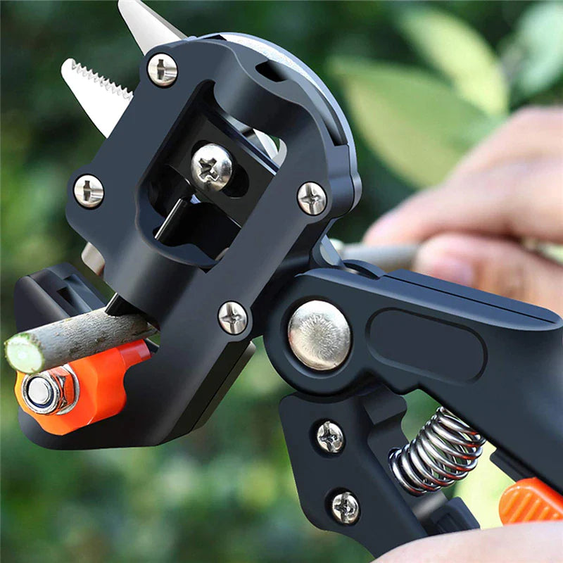 Garden grafting tool making a grafting cut on a small branch
