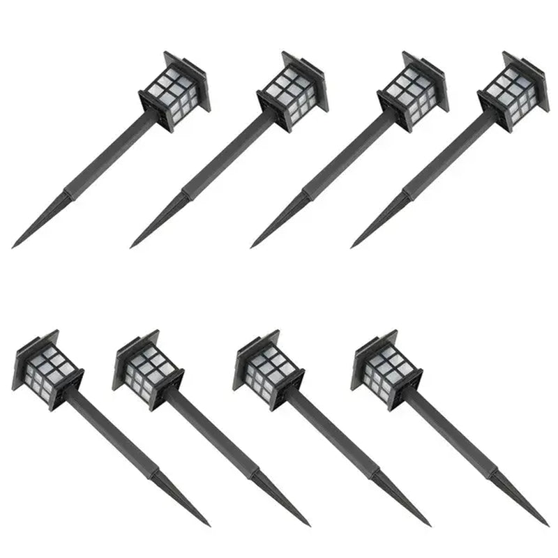 8-pack solar garden pathway lights shown at an angle