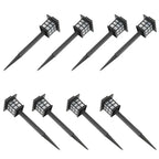 8-pack solar garden pathway lights shown at an angle